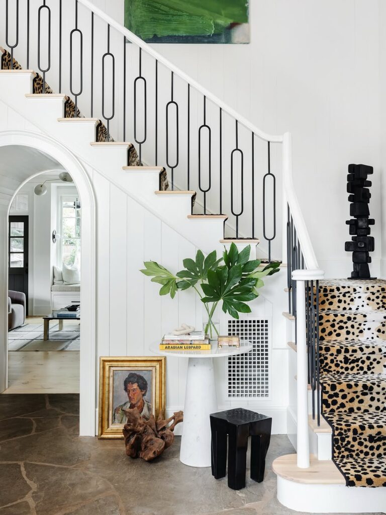vintage staircase gallery wall gold frames